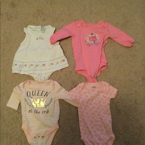 4 baby outfits.